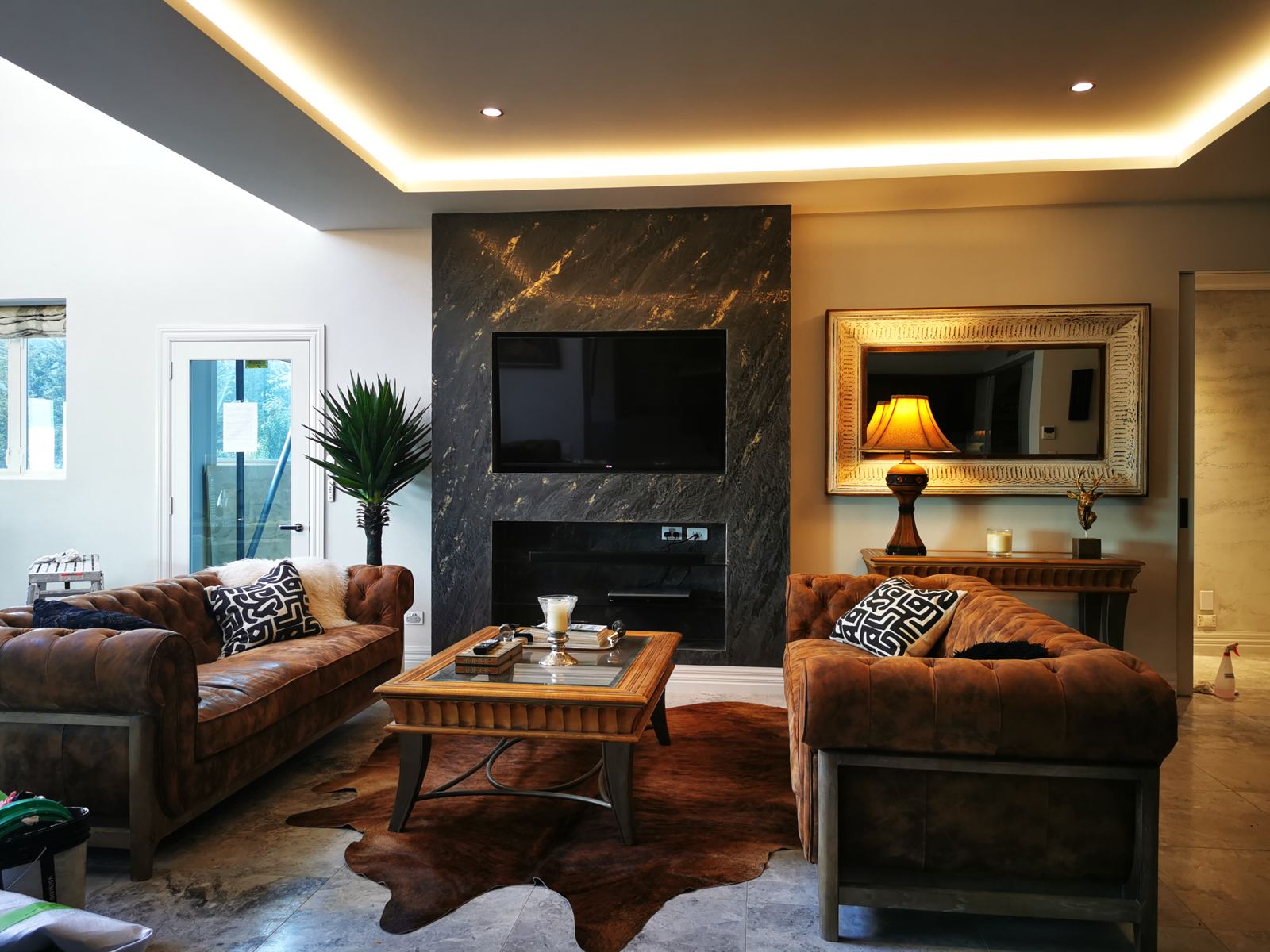 Dark and gold polished plaster fireplace wall, Cashmere Hill